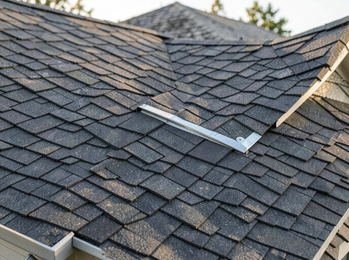 Illustration of residential shingle roofing and flashing